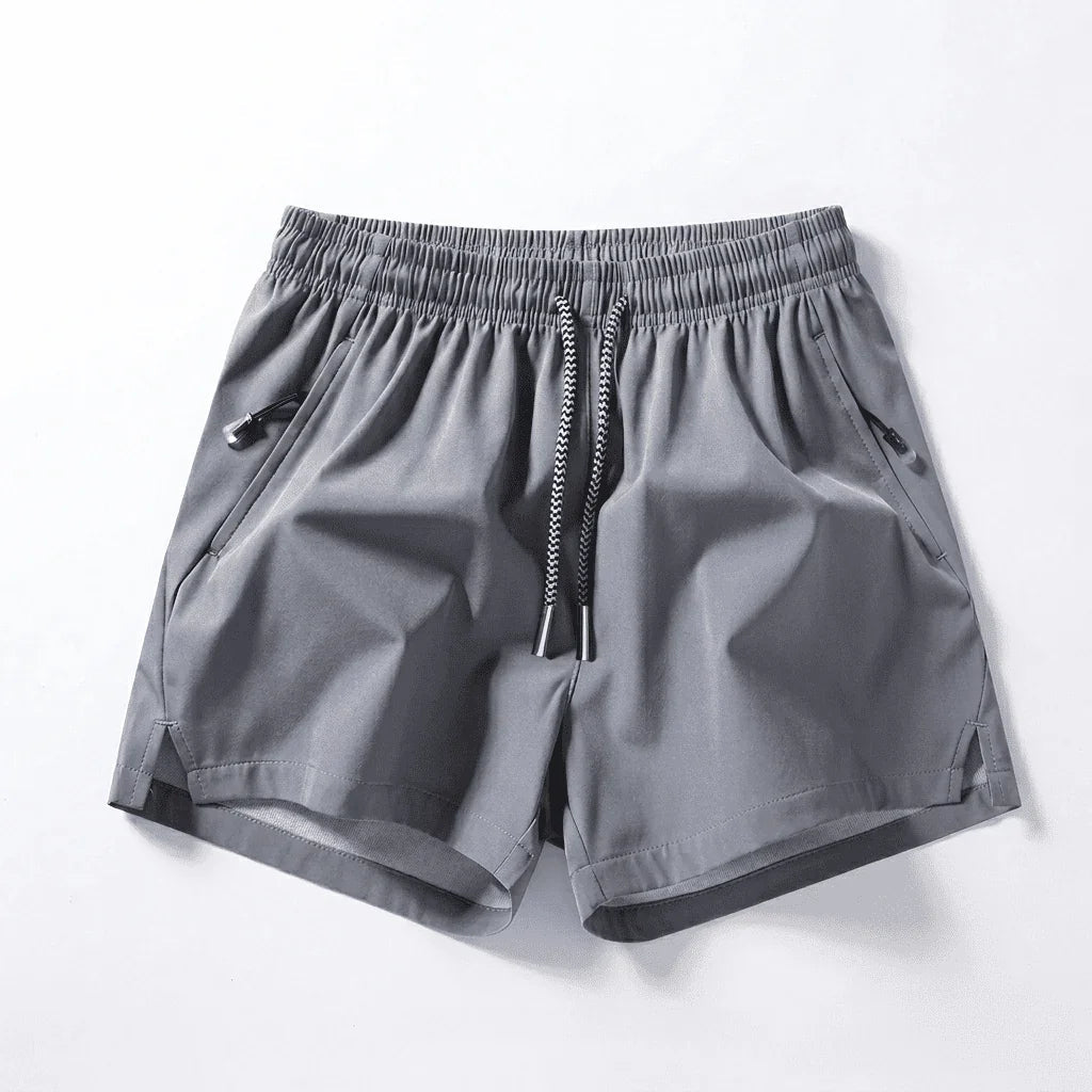 Pantalones cortos deportivos Ethan™ confeccionados con un tejido de alta movilidad, de secado rápido y muy elástico